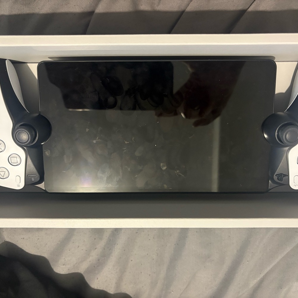 Sony Portable Handheld Gaming Controller - White and Black